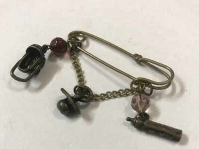 metal brooch