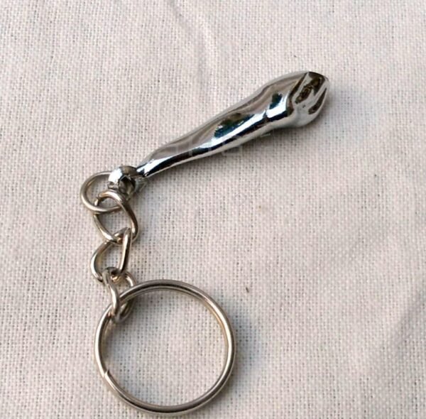 Canine tooth shaped keychain for dental promotions