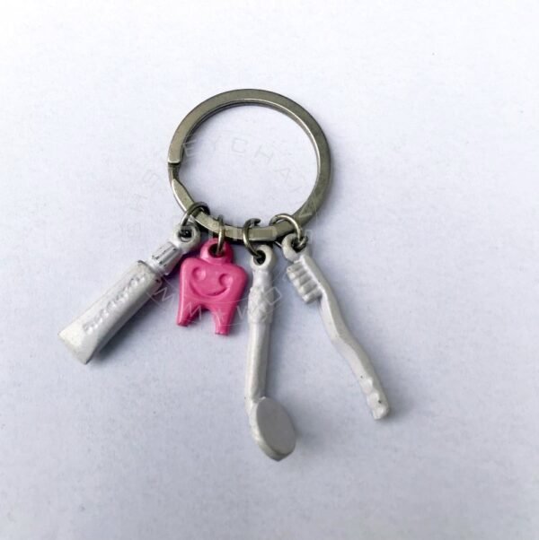 Pink tooth with Brush, Paste and Mirror Charms keychain - Image 2