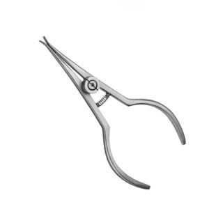 Dental extraction forceps used by a dentist to remove a tooth (stainless steel instrument).